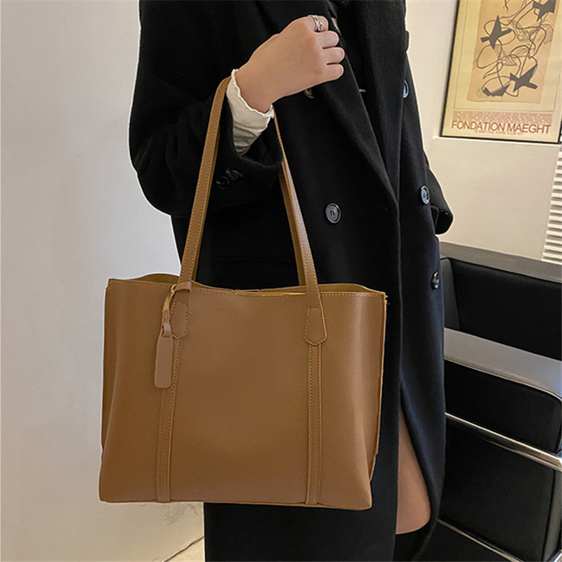 Klassieke zwarte handtas van k - Leatherwork Wallet recensie en prijs